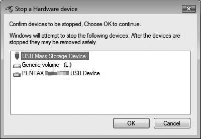 3 Valige [USB Mass Storage Device] ja klõpsake [OK]. Kuvatakse teade, mis lubab riistvara ohutult eemaldada. 4 Ühendage USB-kaabel Windowsi arvuti ja kaamera küljest lahti.
