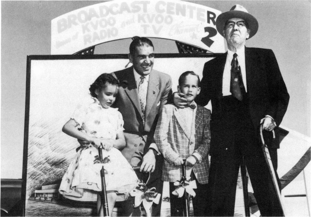 Three generations take part in groundbreaking ceremonies for KVOO's Broadcast Center in 1955. Left to Right: Randi Stuart (now Wightman), Harold C.