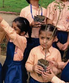 Students from different classes came in their uniforms and enthusiastically planted tree saplings as well as small plants at the given places, with the help of the drive officials and