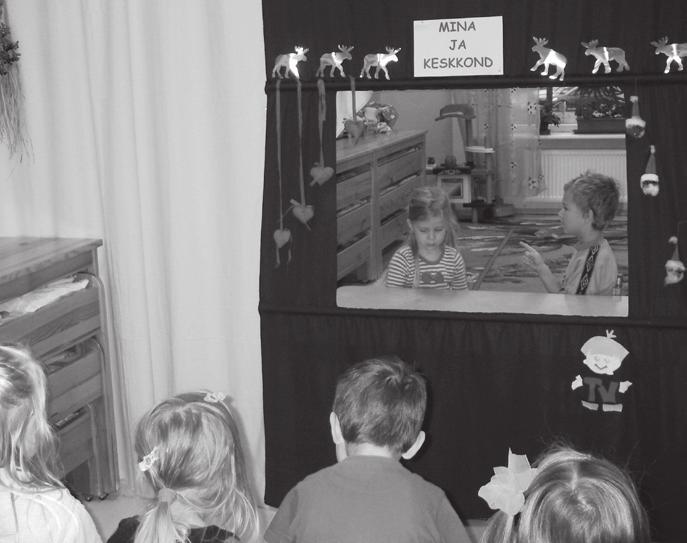 VAHENDID: Kangas (must, hall, pruun), mille sisse on lapse näo kõrgusele lõigatud televiisorit meenutav neljakandiline ava (mõõtmetega meeter korda meeter).