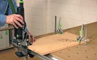 In accordance with the Festool system concept, the screw and lever clamps match the hole grid on the tabletop as well as the
